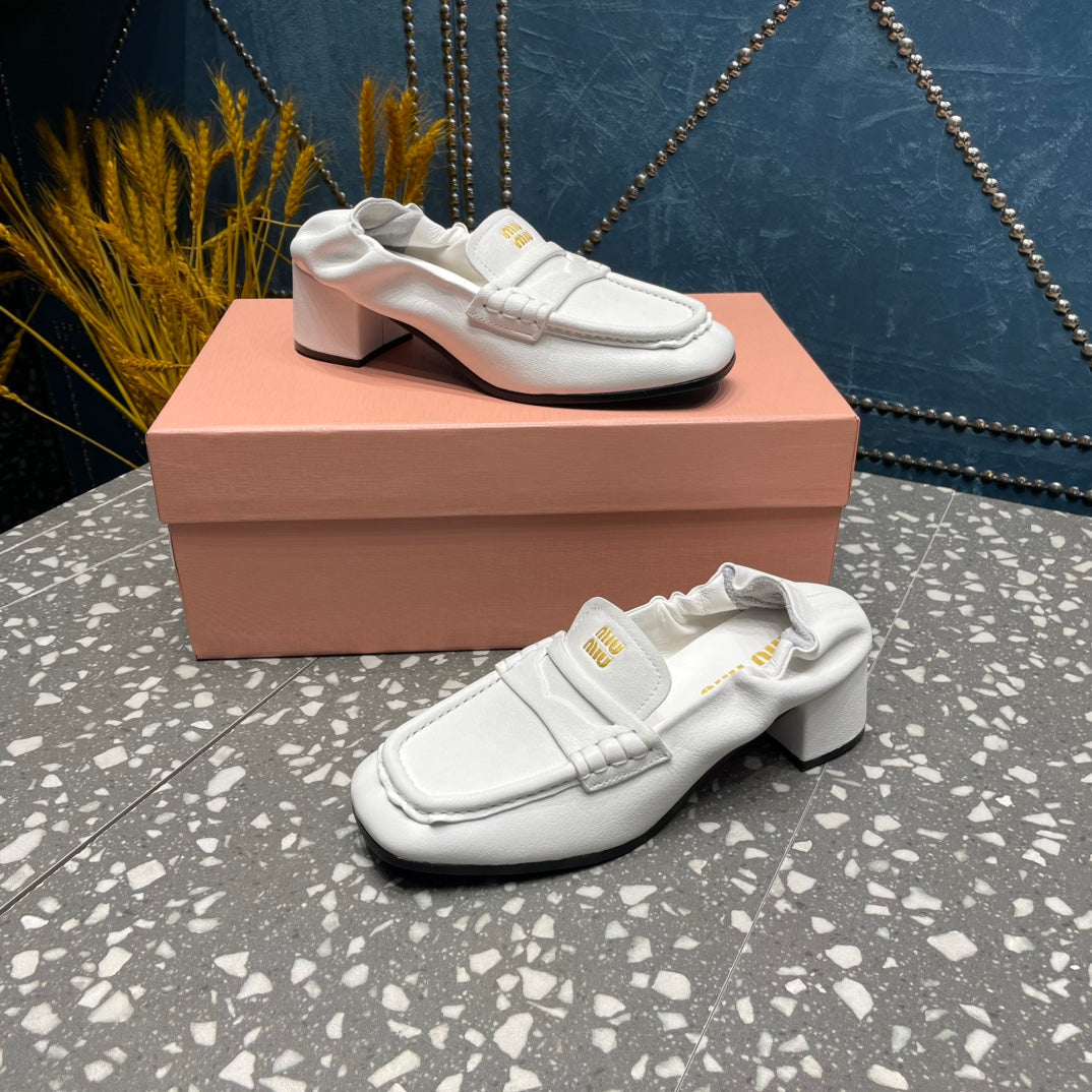 HIGH BROGUE LOAFERS IN WHITE LAMBSKIN