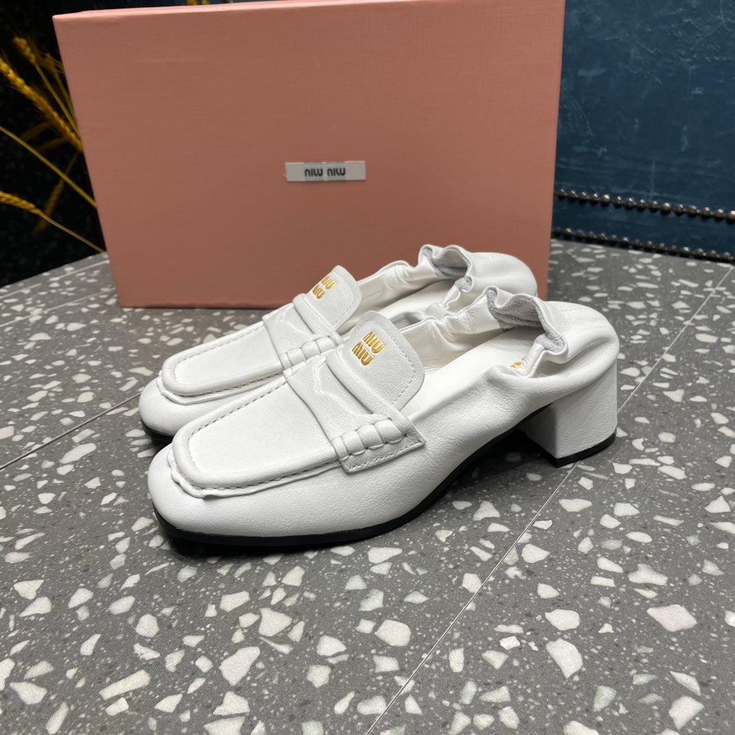 HIGH BROGUE LOAFERS IN WHITE LAMBSKIN