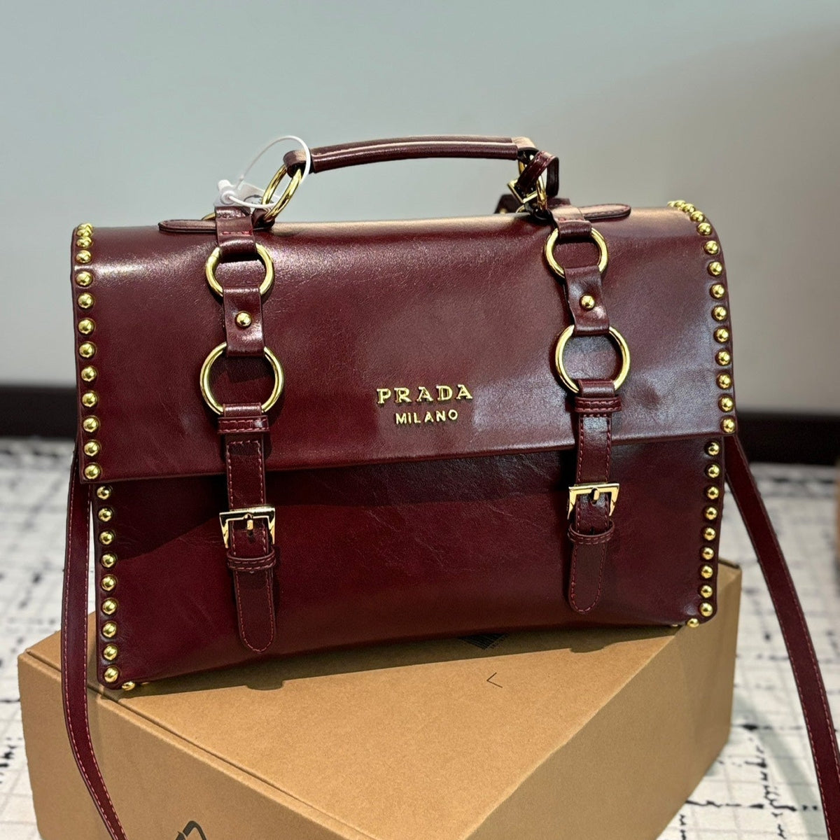 STUDDED BRIEFCASE 34 IN BURGUNDY RED SHINY SMOOTH CALFSKIN
