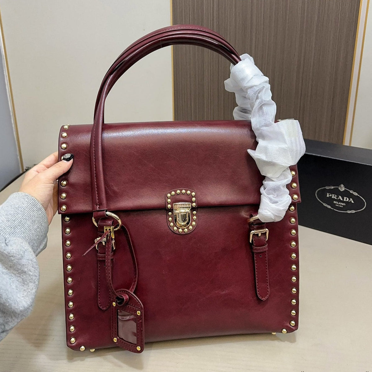 STUDDED TOP HANDLE BAG 33 IN BURGUNDY RED SMOOTH CALFSKIN