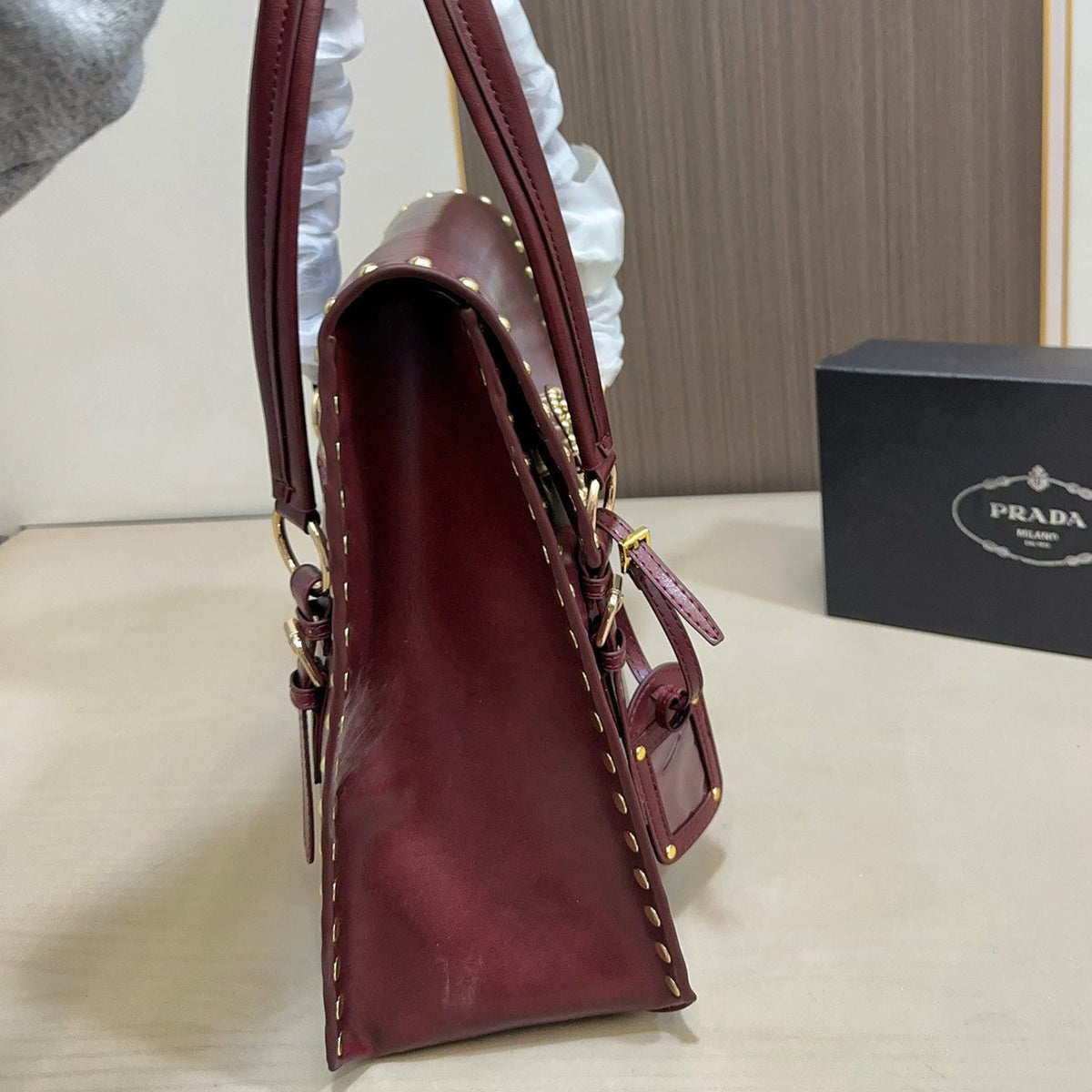 STUDDED TOP HANDLE BAG 33 IN BURGUNDY RED SMOOTH CALFSKIN