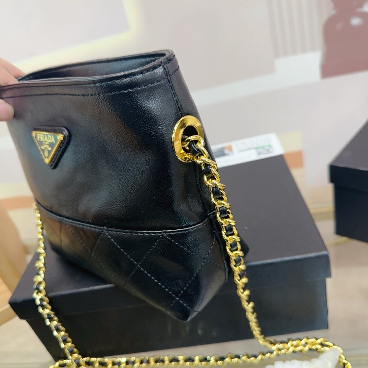 QUILTED CHAIN MINI HOBO BAG 19 IN SHINY BLACK CALFSKIN