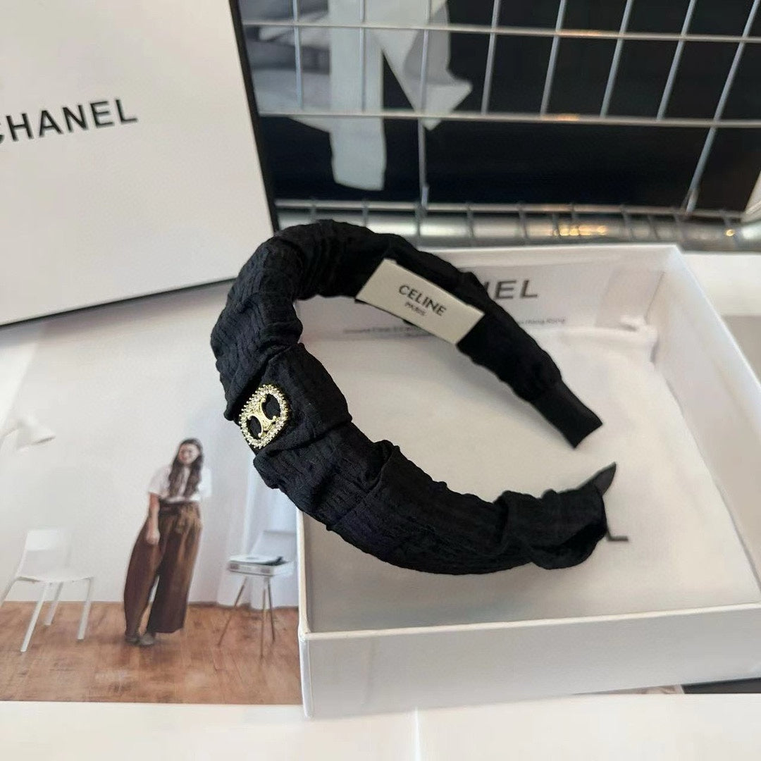 BLACK FABRIC WITH GOLD LOGO HAIRBAND 414448