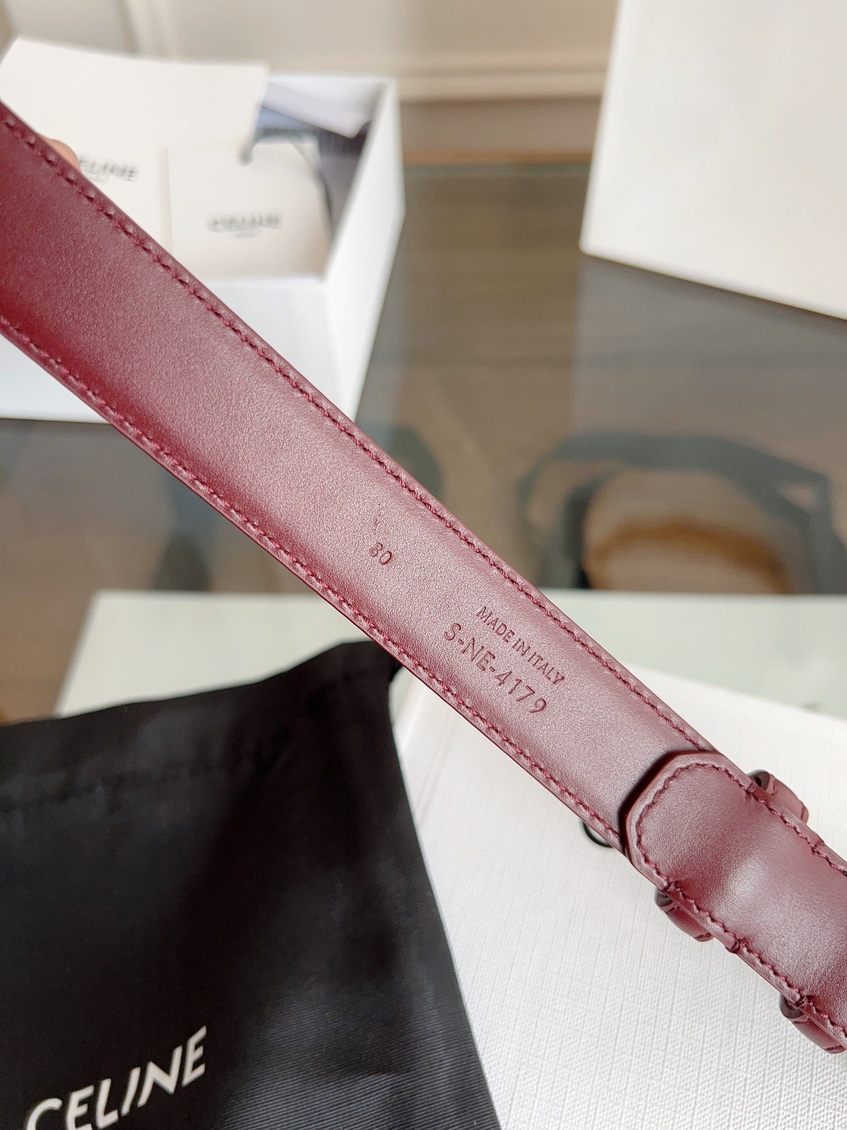 TRIOMPHE BELT 24MM IN WINE RED CALFSKIN WITH GOLD BUCKLE