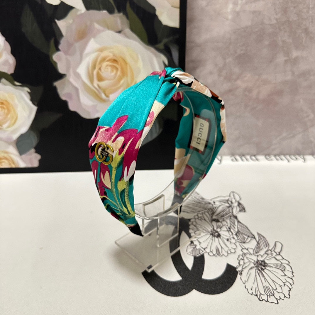 HAIRBAND IN TURQUOISE GREEN FLORAL SILK 252676