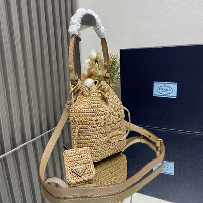 BUCKET BAG 20 IN BEIGE WOVEN RAFFIA EMBOSSED LOGO