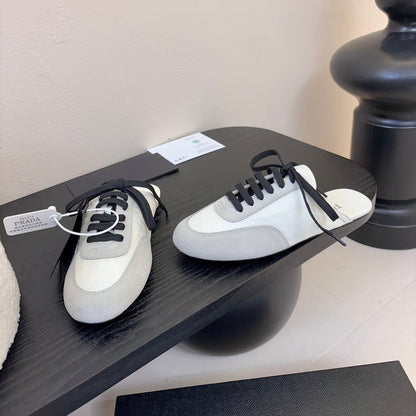 SNEAKER MULES IN BEIGE SUEDE AND WHITE NYLON