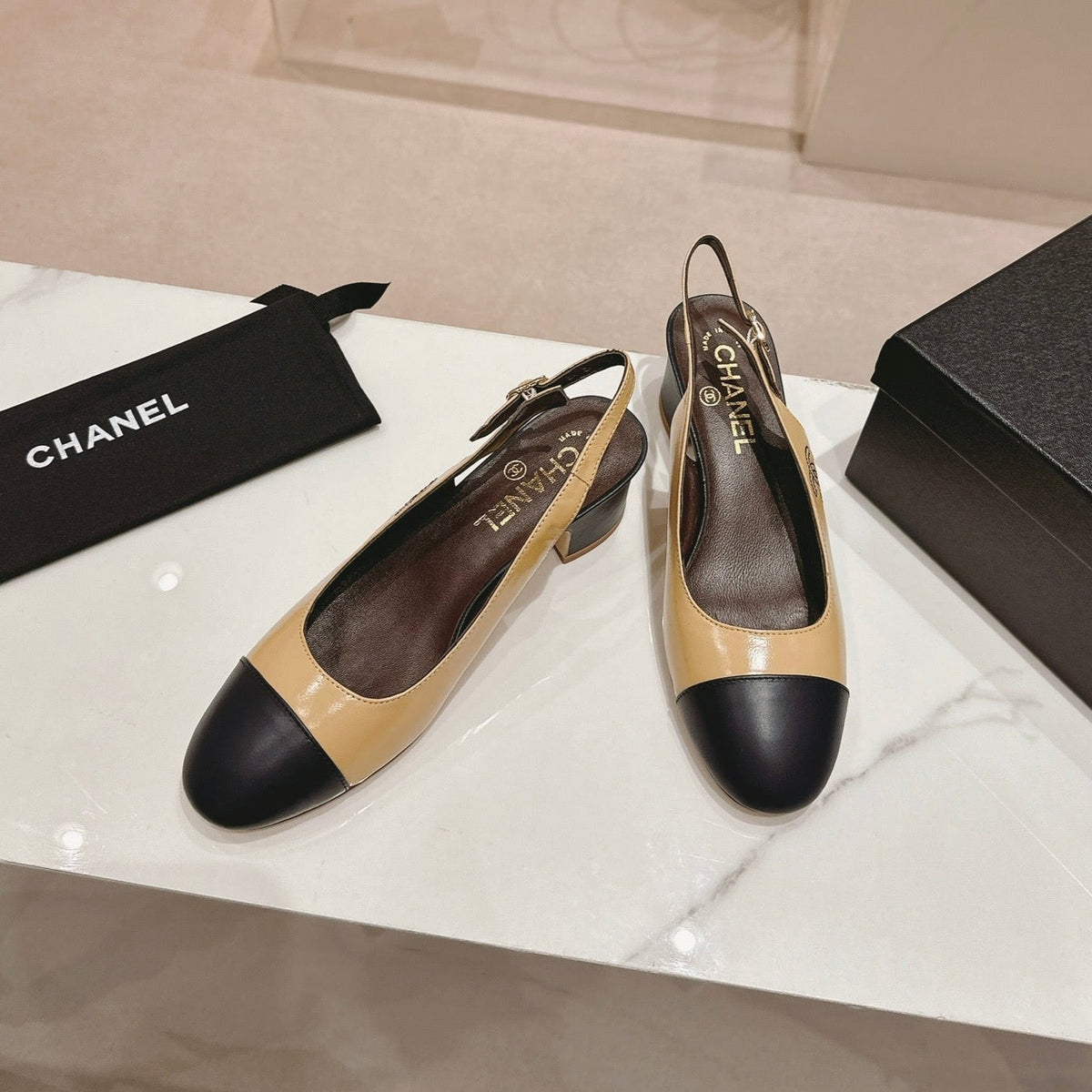 SLINGBACKS PEANUT BROWN MIX BLACK SHEEPSKIN