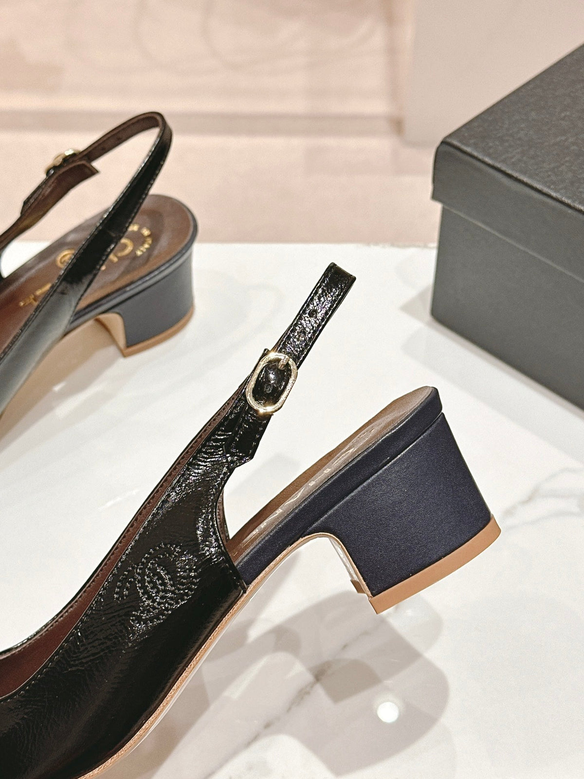 SLINGBACKS IN BLACK SHEEPSKIN