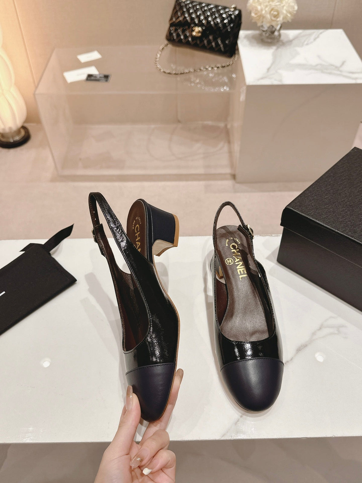 SLINGBACKS IN BLACK SHEEPSKIN