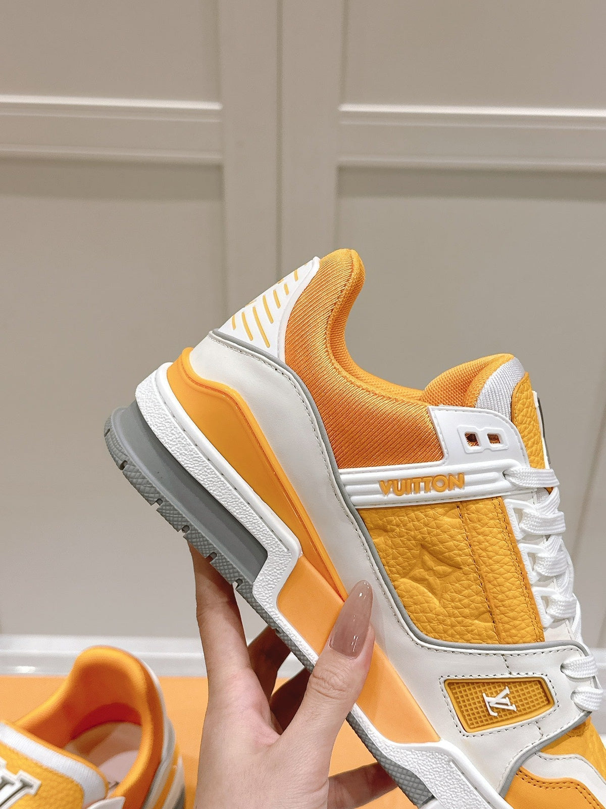 LV TRAINER SNEAKER IN SAFFRAN YELLOW GRAINED CALFSKIN
