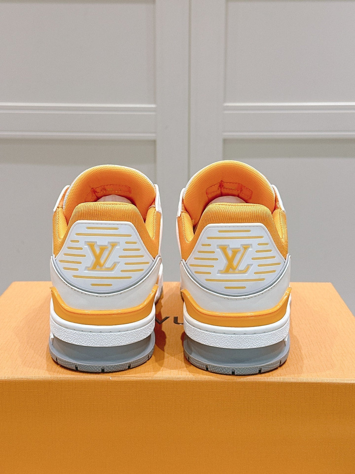 LV TRAINER SNEAKER IN SAFFRAN YELLOW GRAINED CALFSKIN