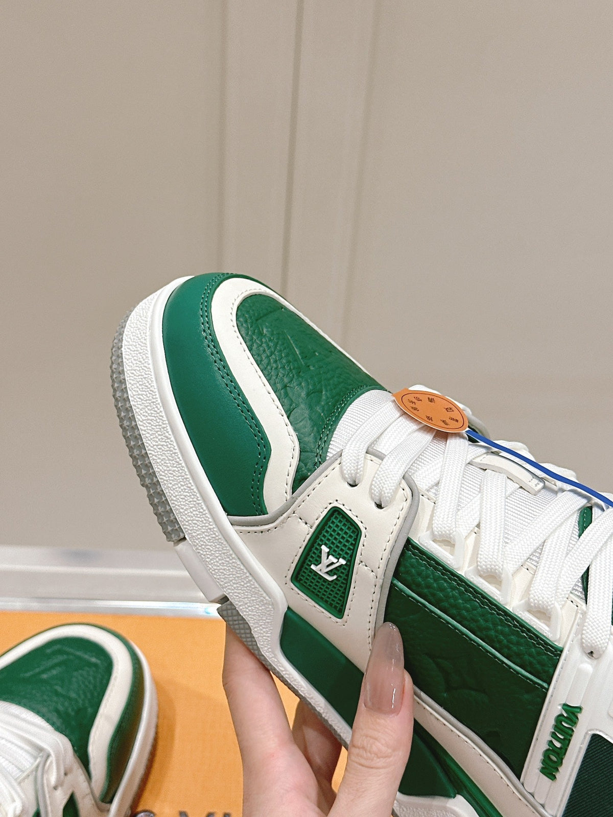 LV TRAINER SNEAKER IN BORNEO GREEN GRAINED CALFSKIN