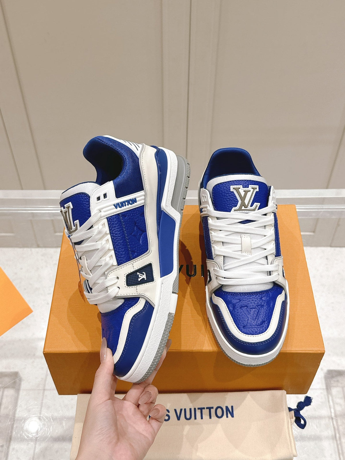 LV TRAINER SNEAKER IN GASTON BLUE GRAINED CALFSKIN