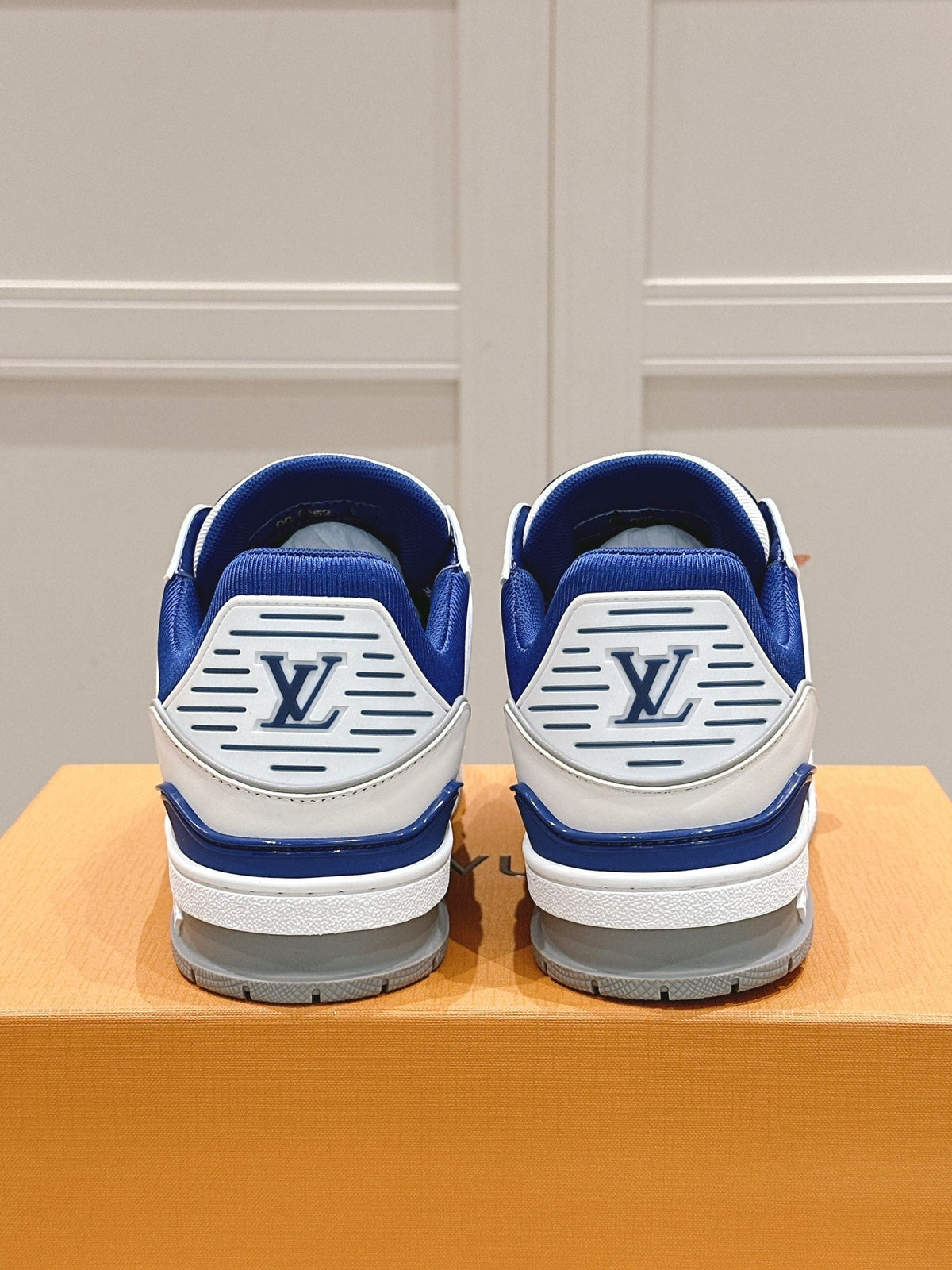LV TRAINER SNEAKER IN GASTON BLUE GRAINED CALFSKIN
