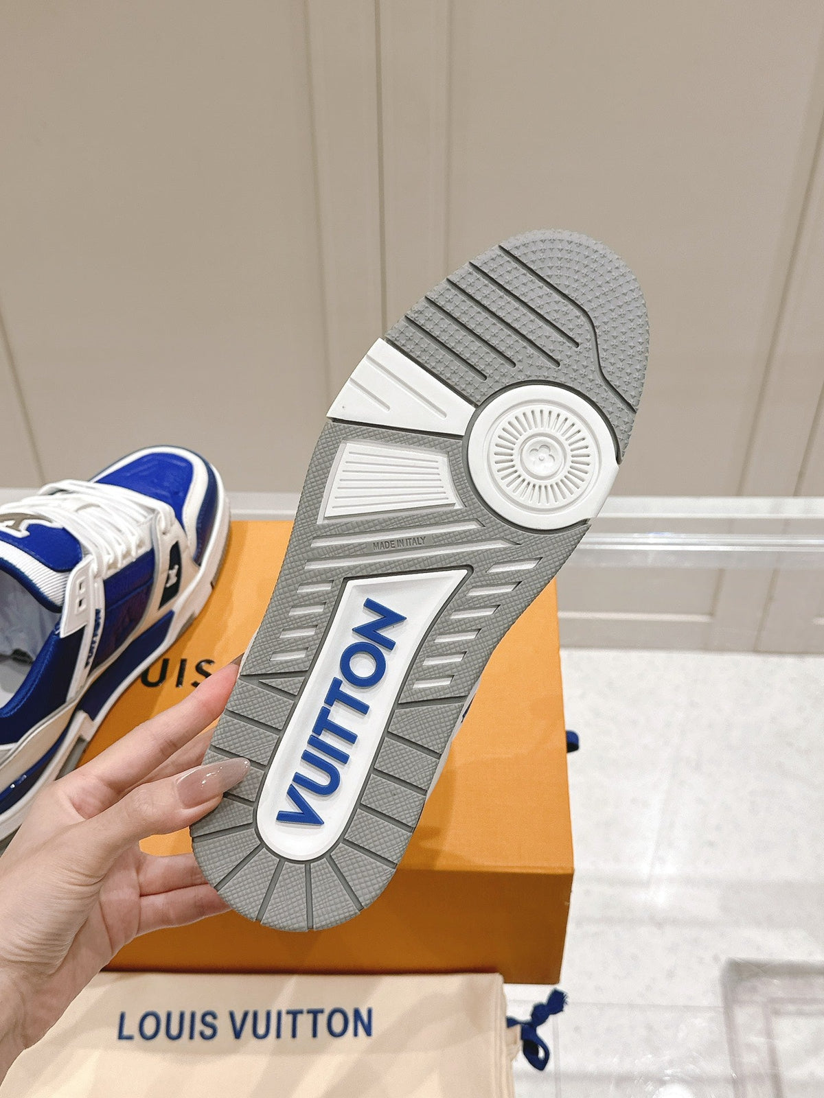 LV TRAINER SNEAKER IN GASTON BLUE GRAINED CALFSKIN