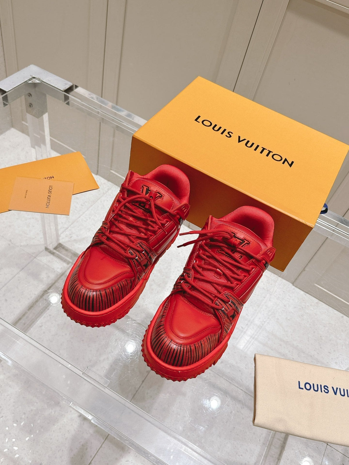 LV TRAINER MAXI LV X PARK SEO-BO IN RUBY RED CALFSKIN