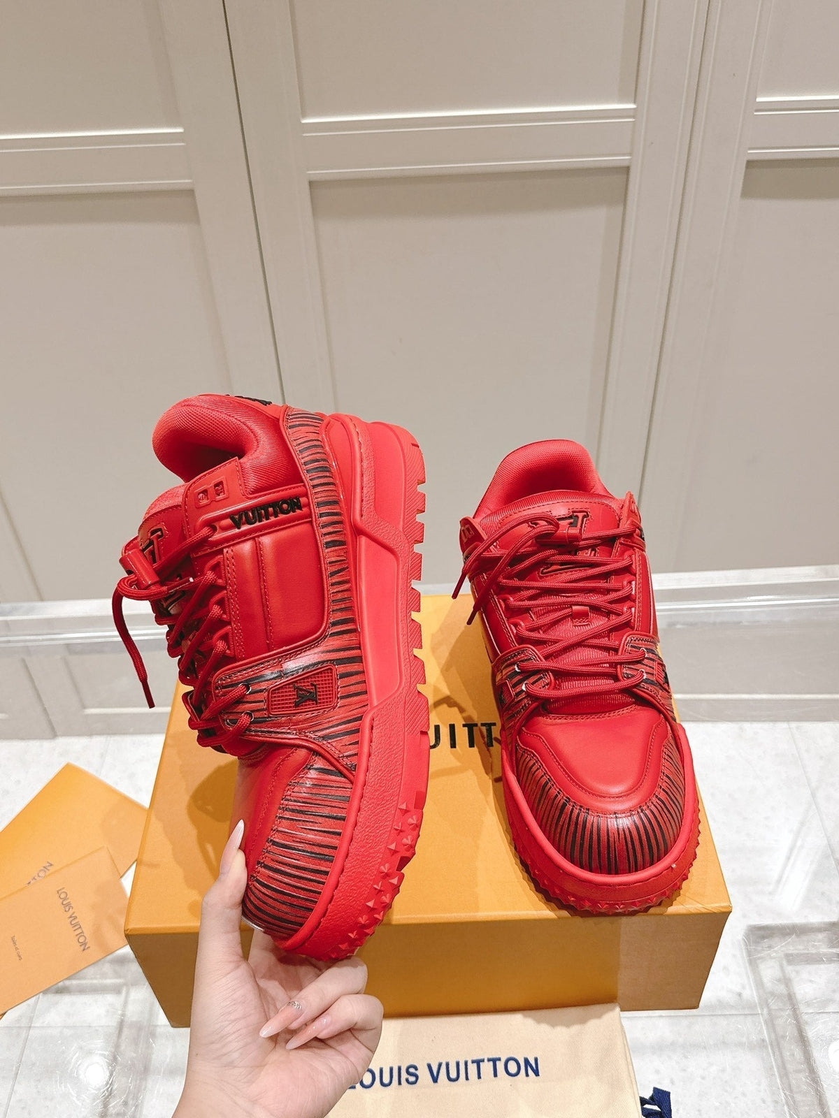 LV TRAINER MAXI LV X PARK SEO-BO IN RUBY RED CALFSKIN