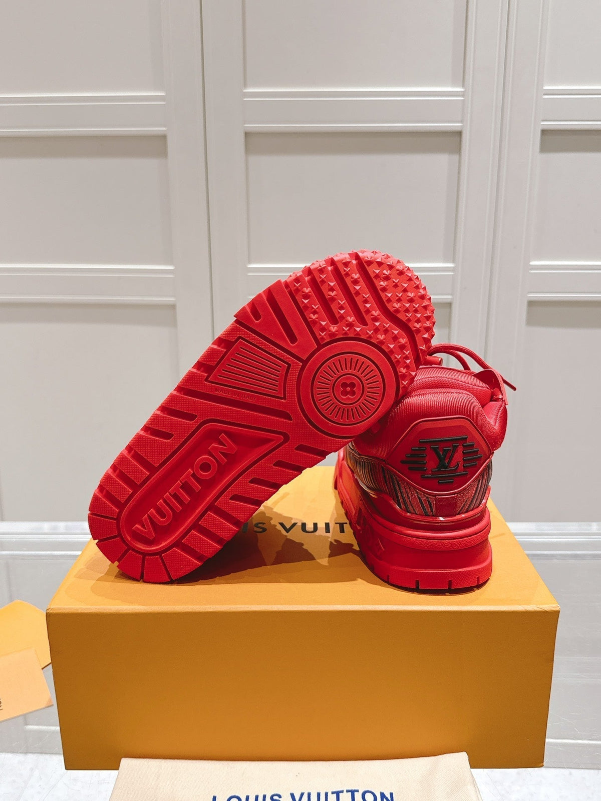 LV TRAINER MAXI LV X PARK SEO-BO IN RUBY RED CALFSKIN
