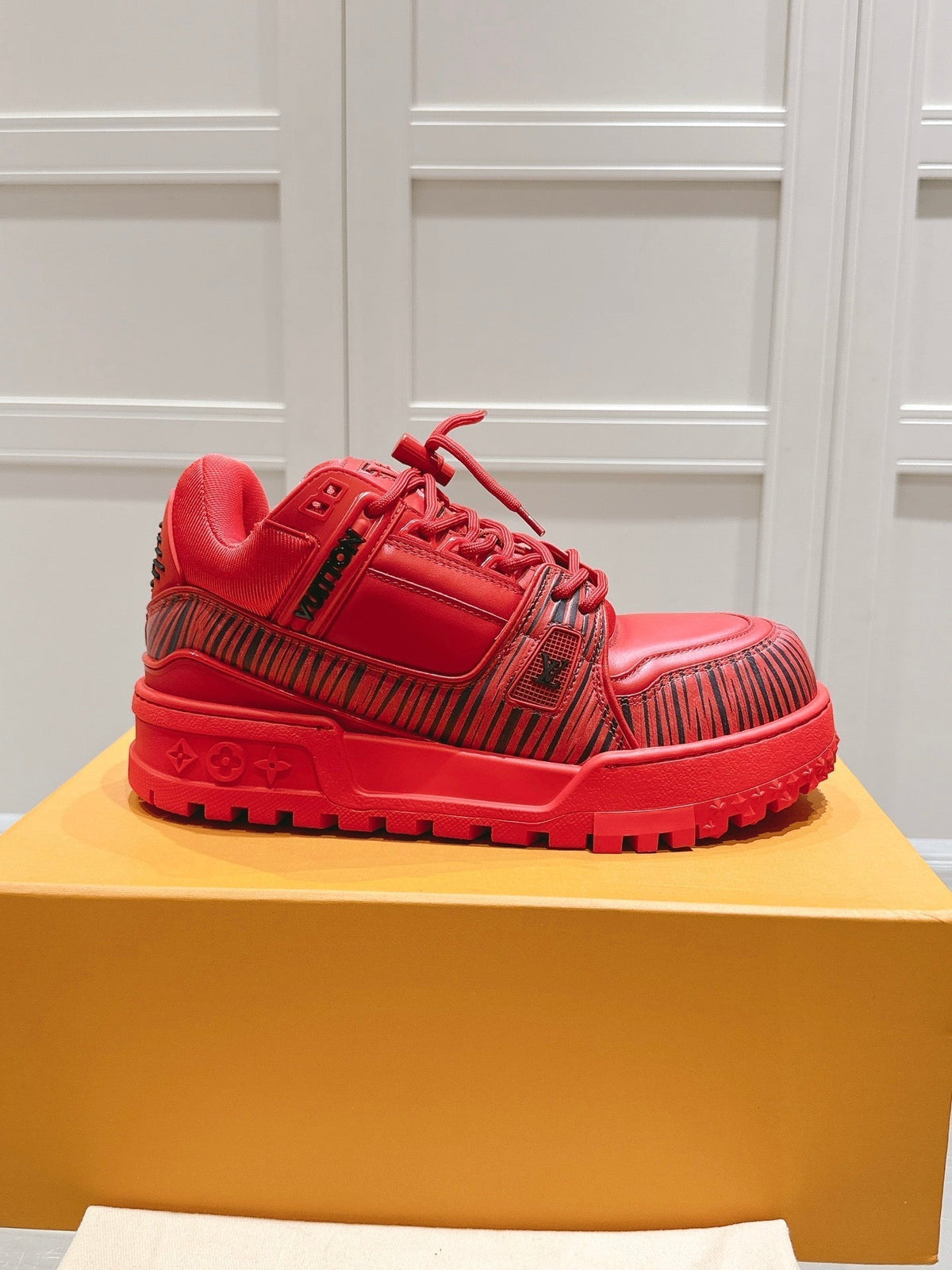 LV TRAINER MAXI LV X PARK SEO-BO IN RUBY RED CALFSKIN