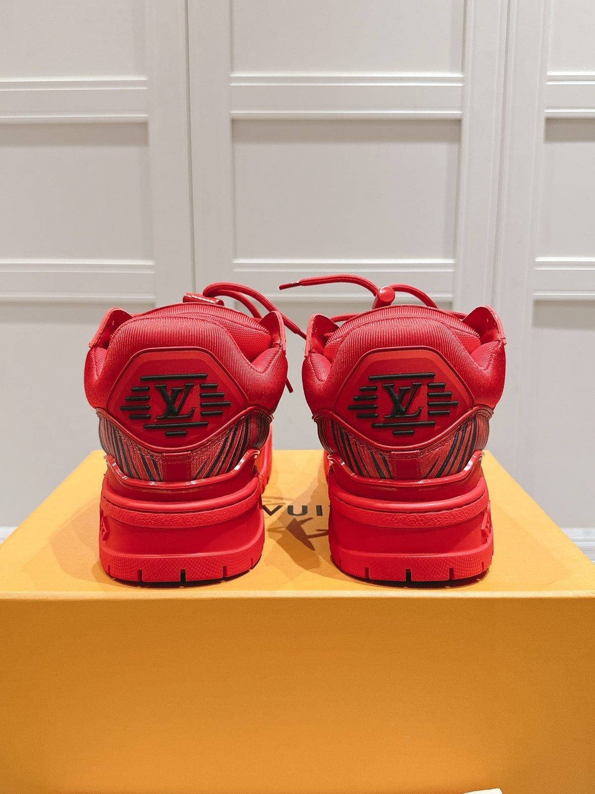 LV TRAINER MAXI LV X PARK SEO-BO IN RUBY RED CALFSKIN