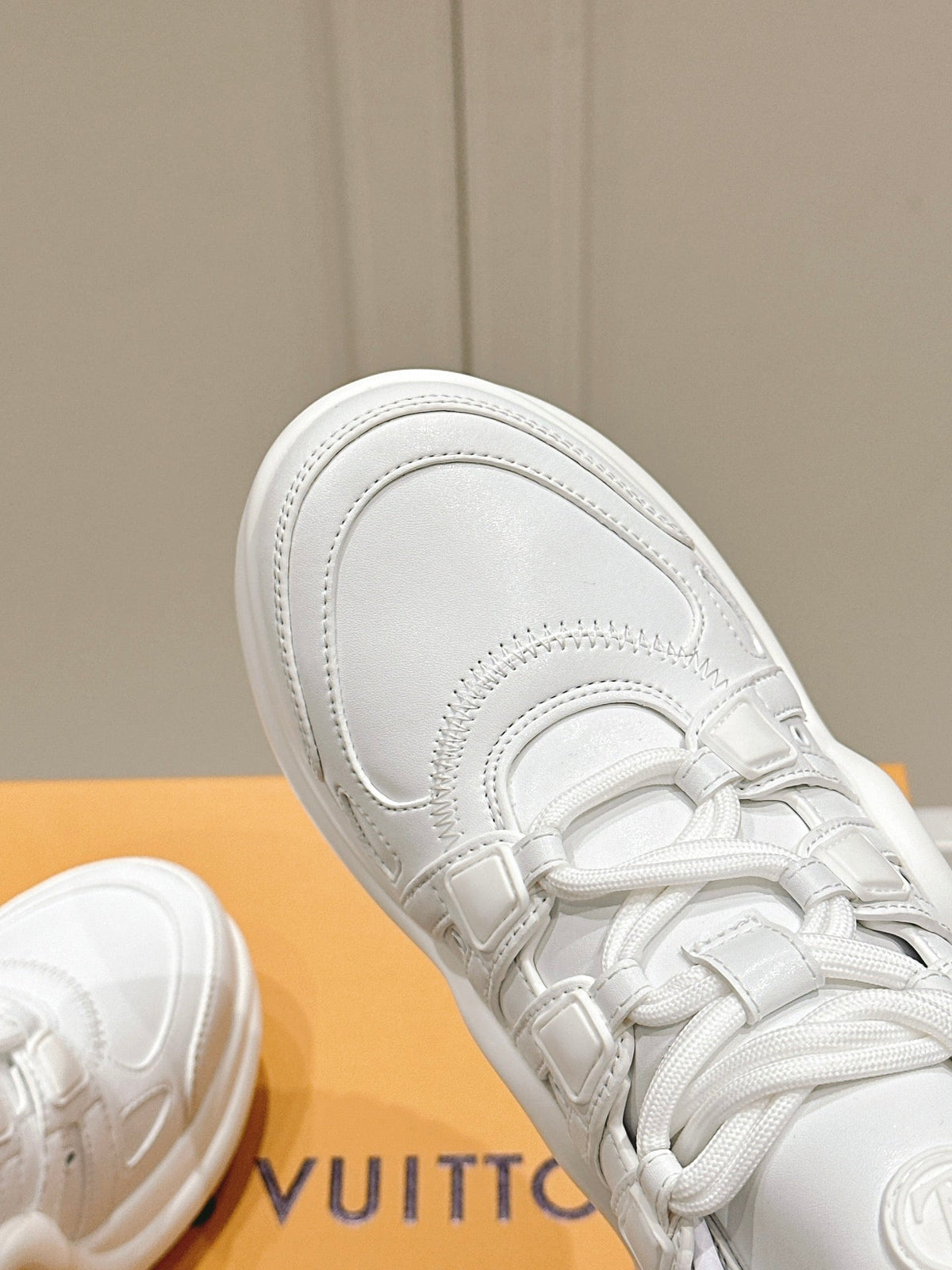 LV BARRACUDA SNEAKER IN WHITE CALFSKIN
