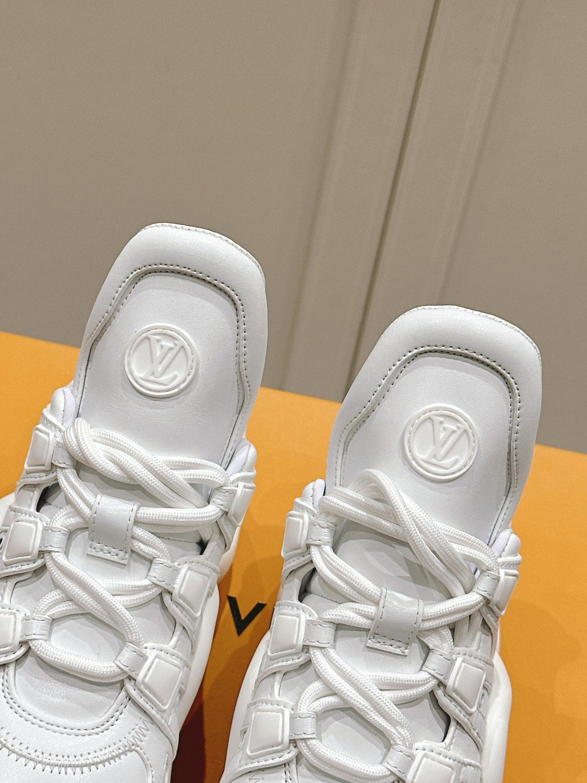 LV BARRACUDA SNEAKER IN WHITE CALFSKIN