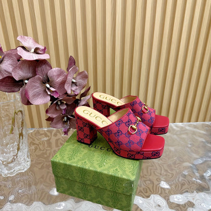 HORSEBIT SLIDE SANDAL IN RED MONOGRAM CANVAS AND SHEEPSKIN LINING
