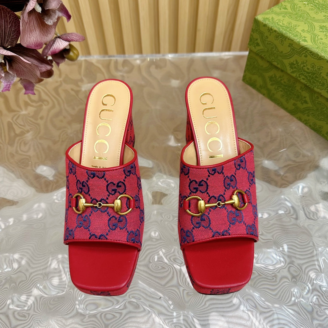 HORSEBIT SLIDE SANDAL IN RED MONOGRAM CANVAS AND SHEEPSKIN LINING