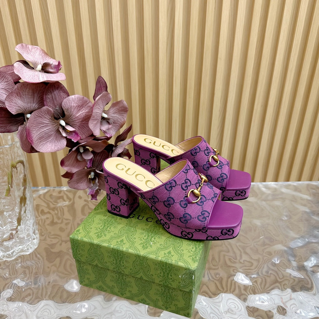 HORSEBIT SLIDE SANDAL IN VIOLET MONOGRAM CANVAS AND SHEEPSKIN LINING