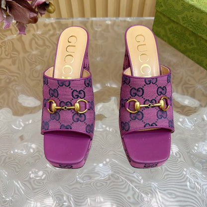 HORSEBIT SLIDE SANDAL IN VIOLET MONOGRAM CANVAS AND SHEEPSKIN LINING