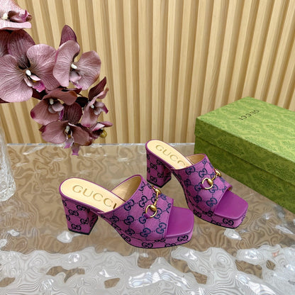 HORSEBIT SLIDE SANDAL IN VIOLET MONOGRAM CANVAS AND SHEEPSKIN LINING