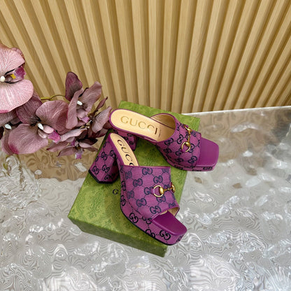 HORSEBIT SLIDE SANDAL IN VIOLET MONOGRAM CANVAS AND SHEEPSKIN LINING