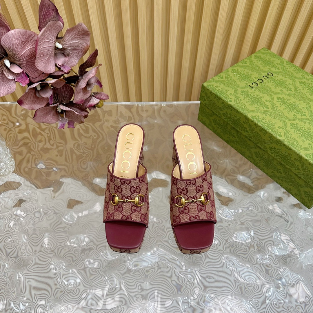 HORSEBIT SLIDE SANDAL IN WINE RED MONOGRAM CANVAS AND SHEEPSKIN LINING