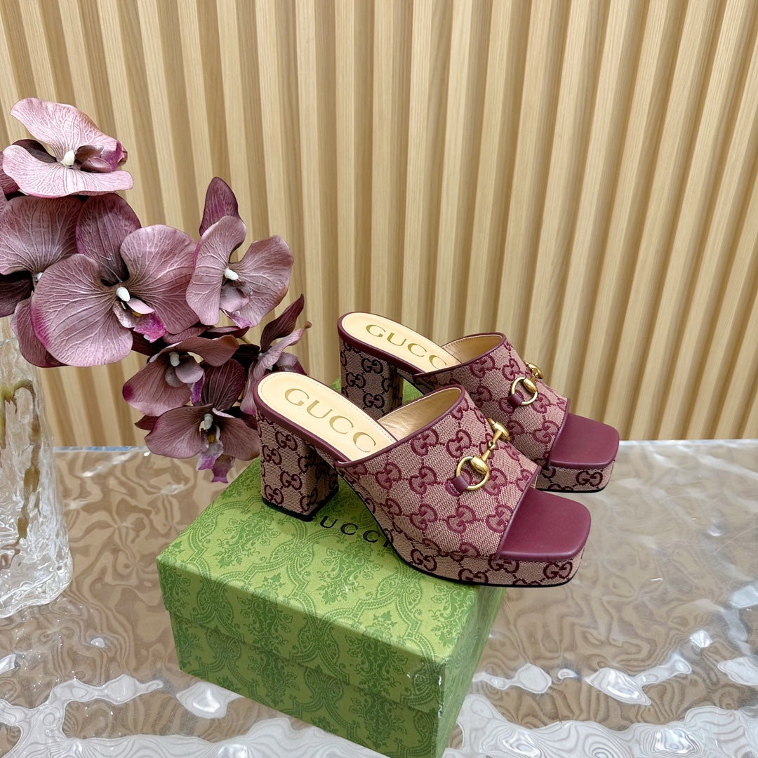HORSEBIT SLIDE SANDAL IN WINE RED MONOGRAM CANVAS AND SHEEPSKIN LINING