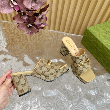 HORSEBIT SLIDE SANDAL IN ECRU BEIGE MONOGRAM CANVAS AND SHEEPSKIN LINING