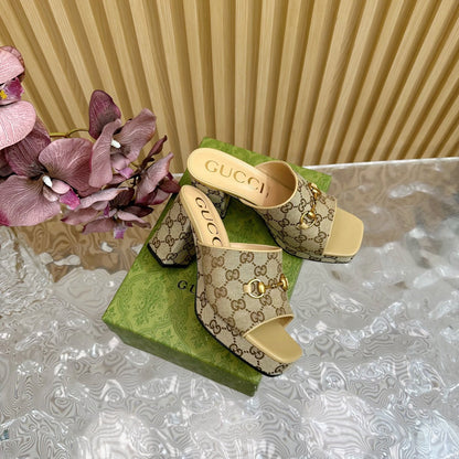 HORSEBIT SLIDE SANDAL IN ECRU BEIGE MONOGRAM CANVAS AND SHEEPSKIN LINING