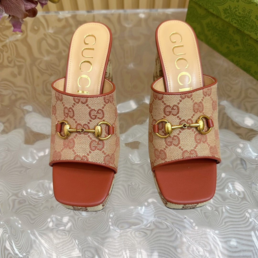 HORSEBIT SLIDE SANDAL IN BRONZE ORANGE MONOGRAM CANVAS AND SHEEPSKIN LINING