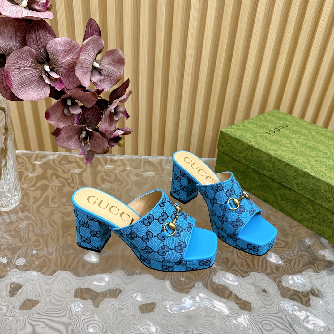 HORSEBIT SLIDE SANDAL IN AZURE BLUE MONOGRAM CANVAS AND SHEEPSKIN LINING