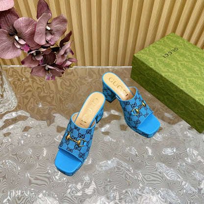 HORSEBIT SLIDE SANDAL IN AZURE BLUE MONOGRAM CANVAS AND SHEEPSKIN LINING