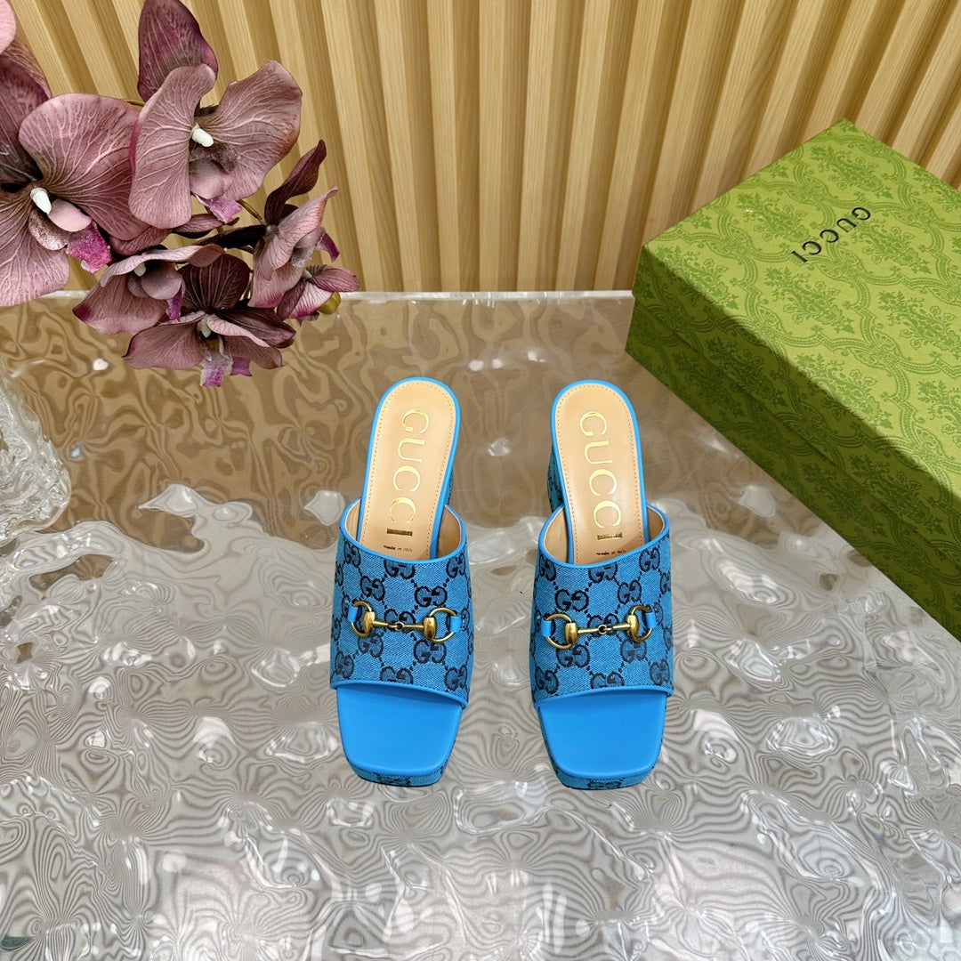 HORSEBIT SLIDE SANDAL IN AZURE BLUE MONOGRAM CANVAS AND SHEEPSKIN LINING