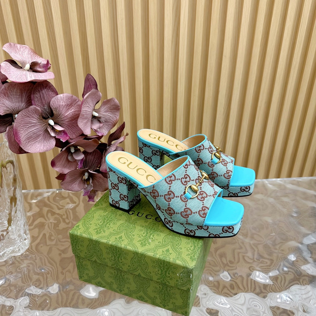HORSEBIT SLIDE SANDAL IN SKY BLUE MONOGRAM CANVAS AND SHEEPSKIN LINING