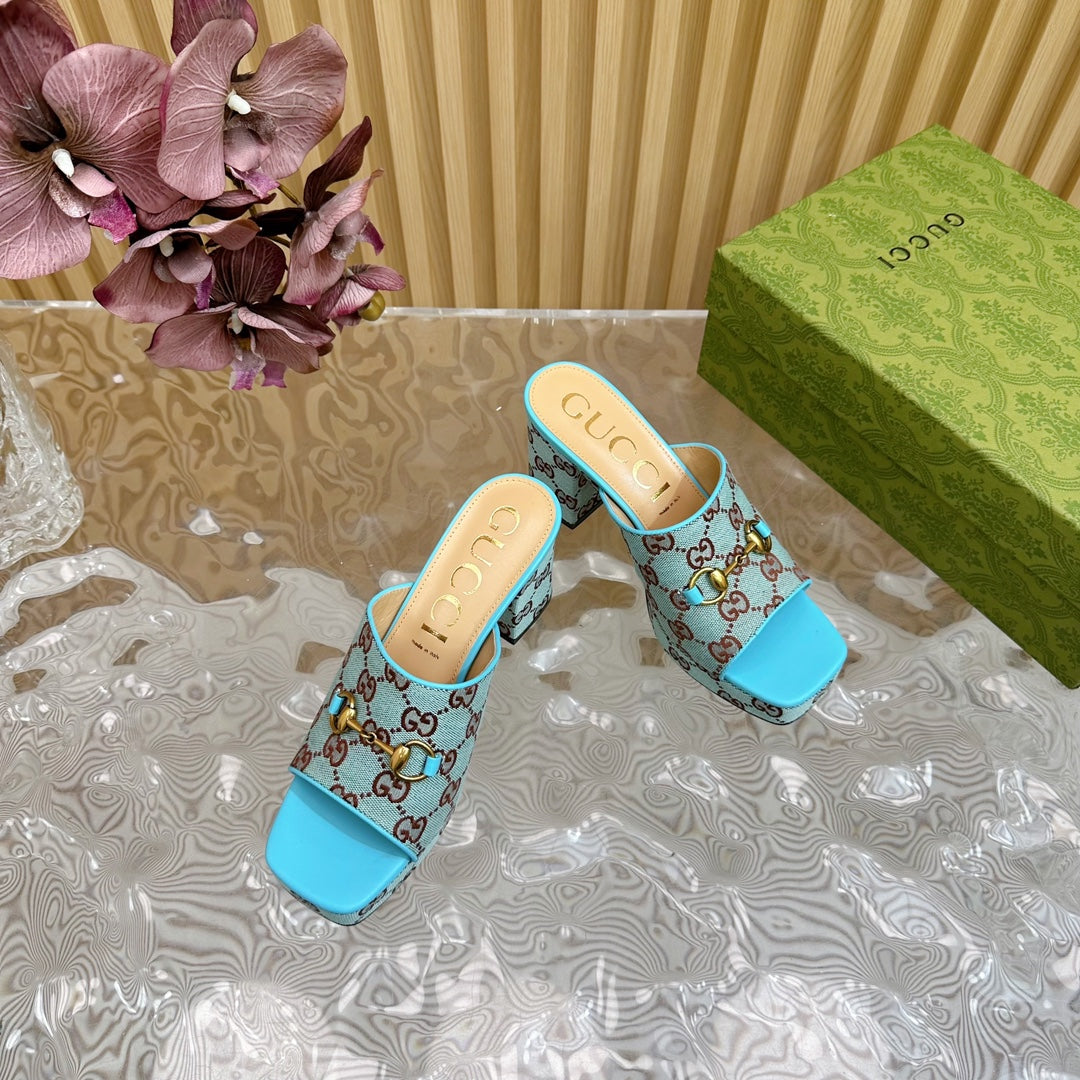 HORSEBIT SLIDE SANDAL IN SKY BLUE MONOGRAM CANVAS AND SHEEPSKIN LINING