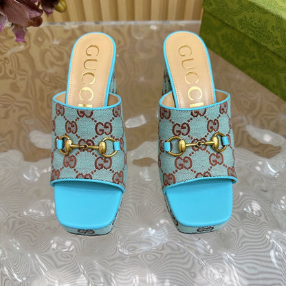 HORSEBIT SLIDE SANDAL IN SKY BLUE MONOGRAM CANVAS AND SHEEPSKIN LINING