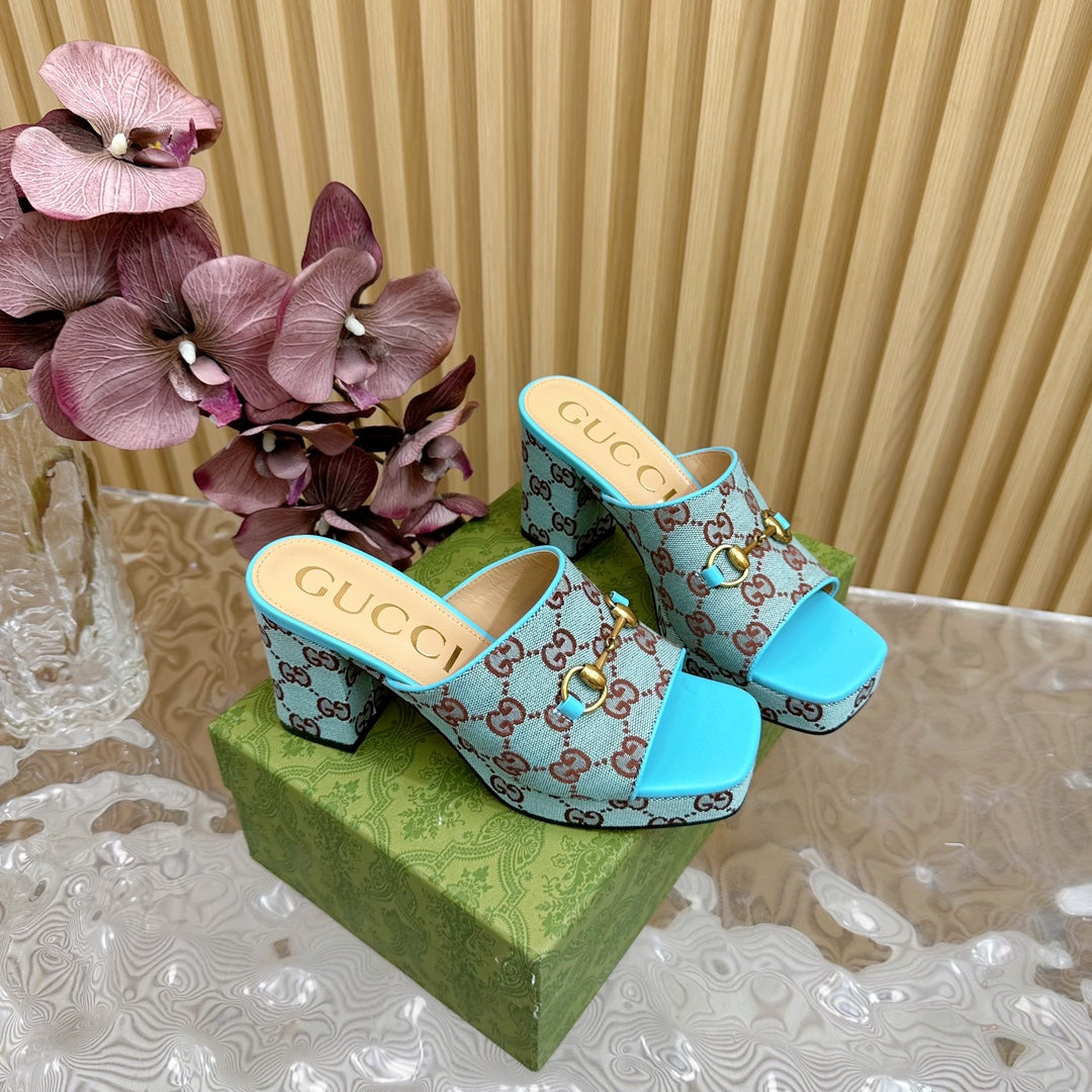 HORSEBIT SLIDE SANDAL IN SKY BLUE MONOGRAM CANVAS AND SHEEPSKIN LINING