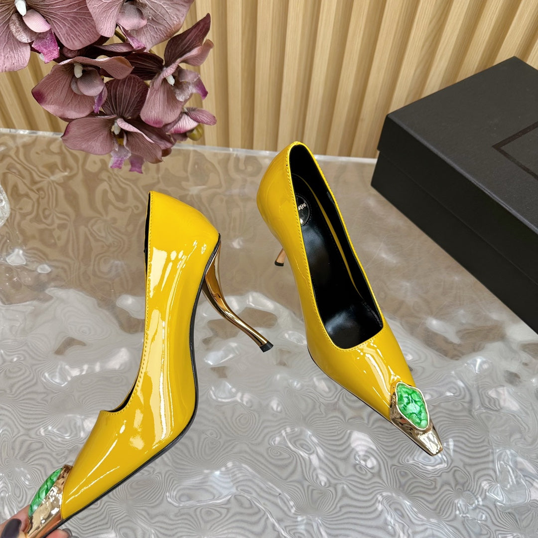GREEN GEM-STUDDED HIGH PUMPS IN YELLOW PATENT CALFSKIN