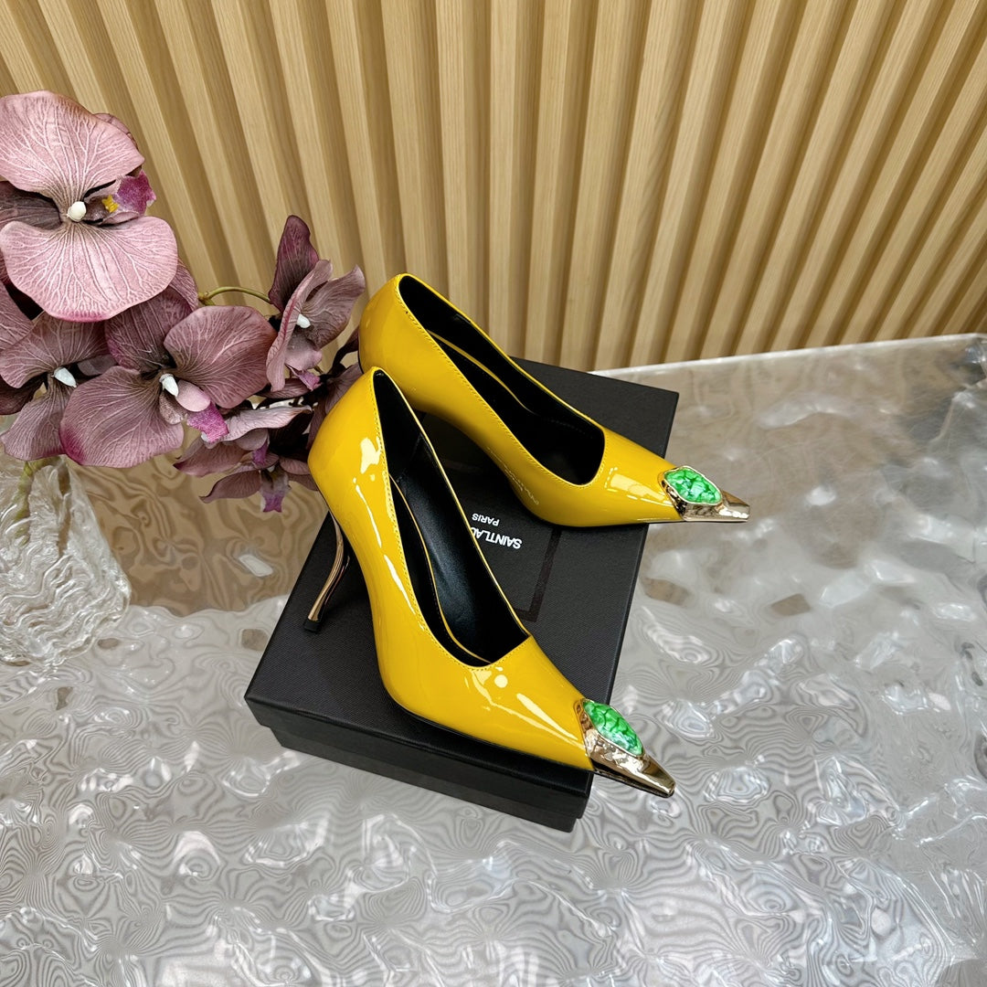 GREEN GEM-STUDDED HIGH PUMPS IN YELLOW PATENT CALFSKIN