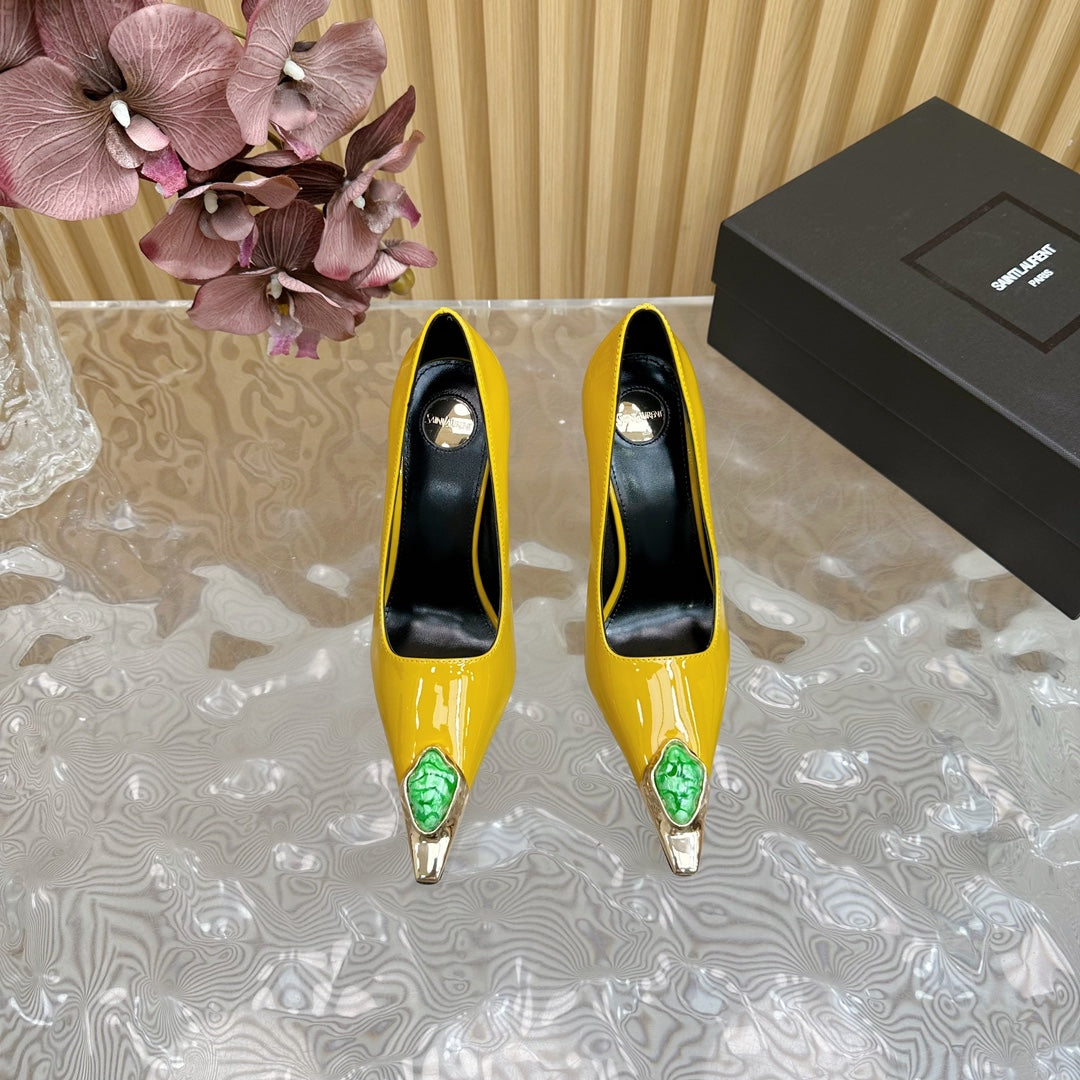 GREEN GEM-STUDDED HIGH PUMPS IN YELLOW PATENT CALFSKIN
