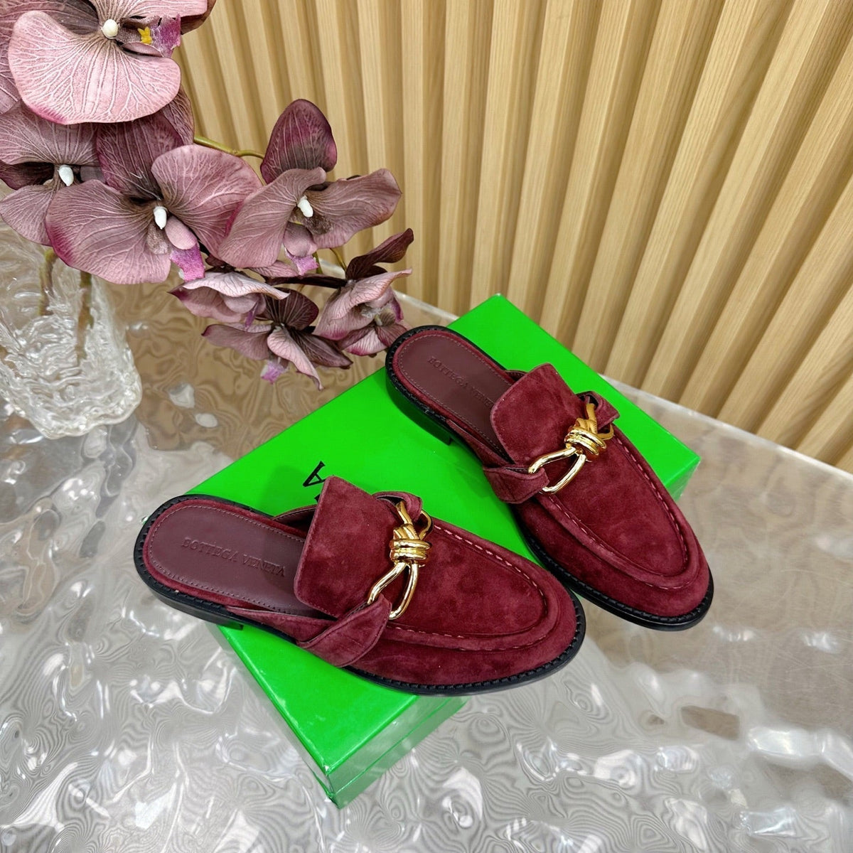 OPEN-BACK LOAFER REALISED IN GARNET RED SUEDE WITH SIGNATURE METALLIC KNOT DETAIL