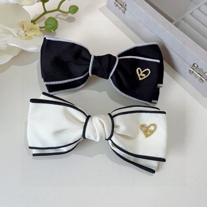 BOW HAIRPIN IN BLACK AND WHITE TRIM COTTON 406022